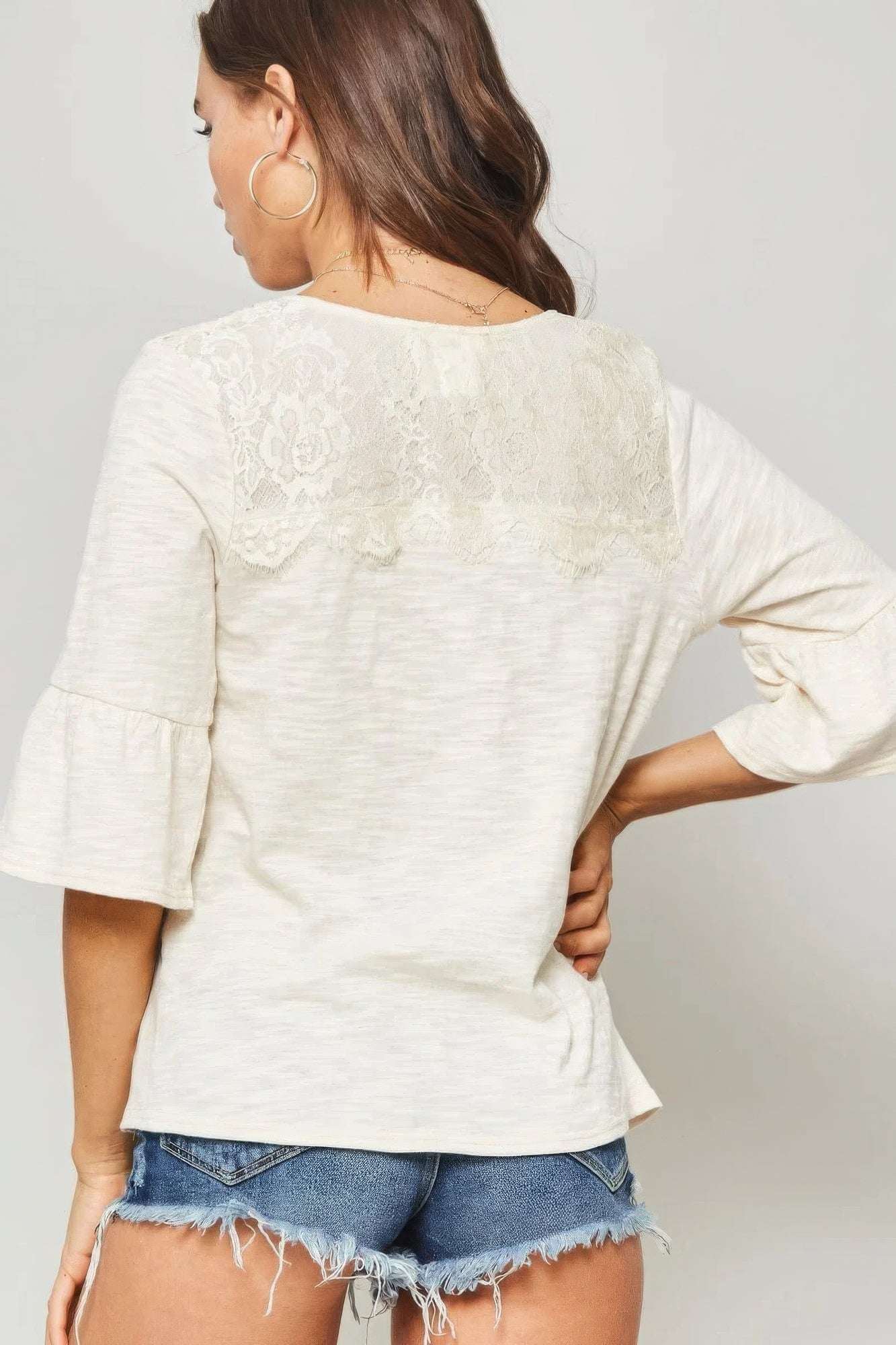 A Knit Top With Deep V Neckline And Yoke Design - The Diva Goddess