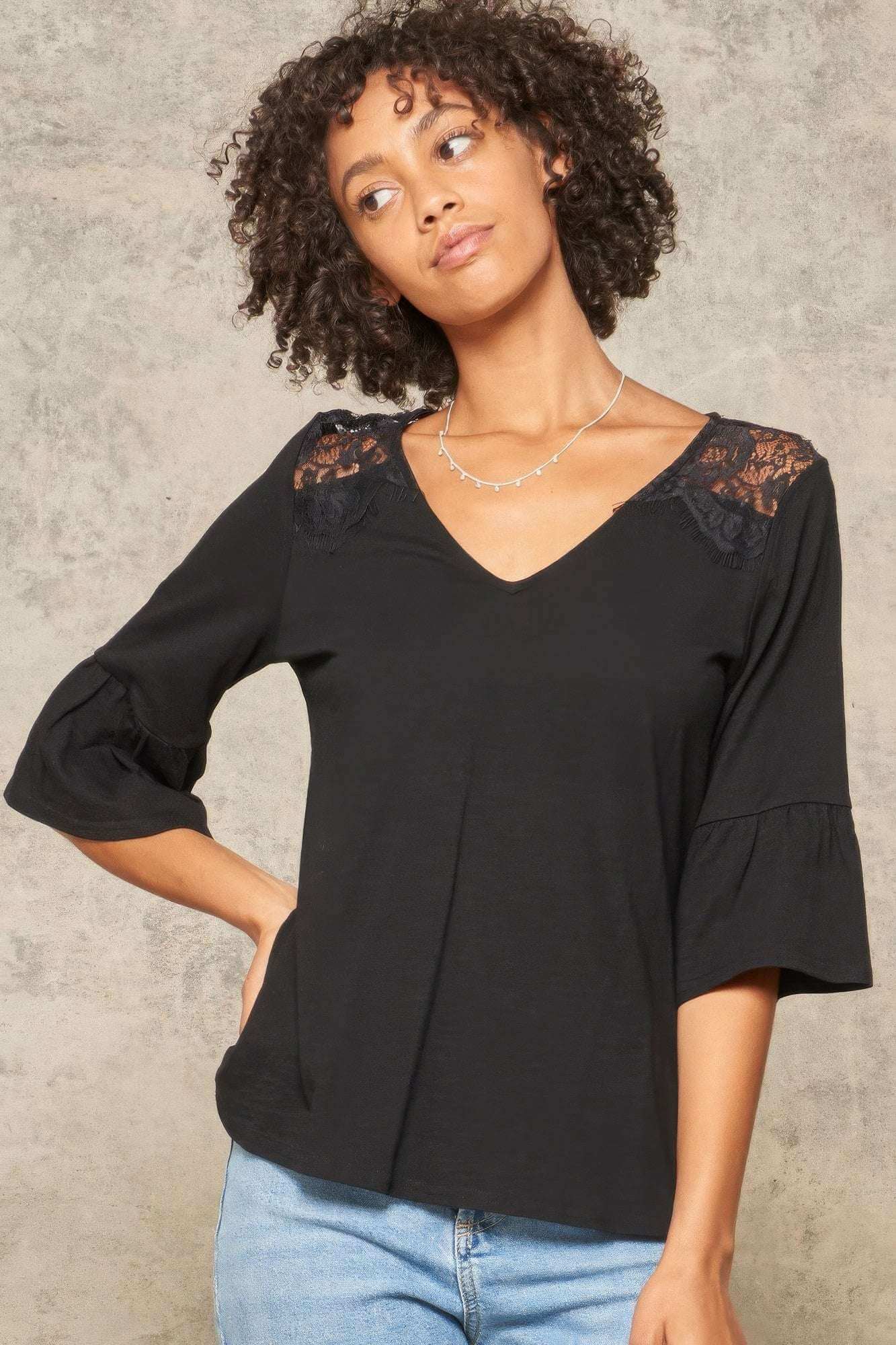 A Knit Top With Deep V Neckline And Yoke Design - The Diva Goddess