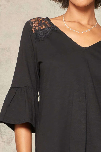 A Knit Top With Deep V Neckline And Yoke Design - The Diva Goddess