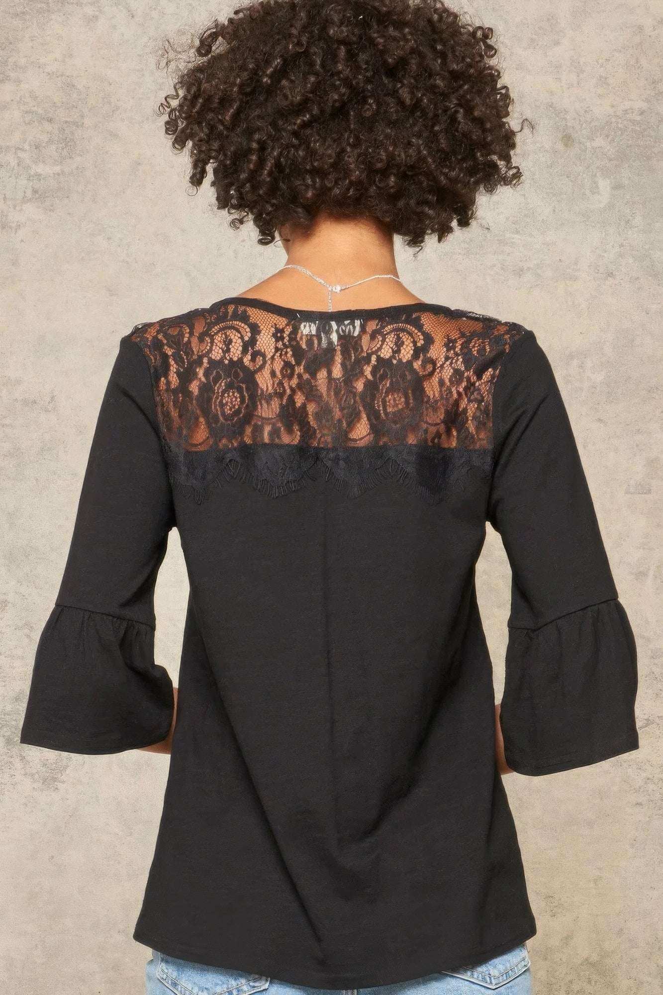 A Knit Top With Deep V Neckline And Yoke Design - The Diva Goddess