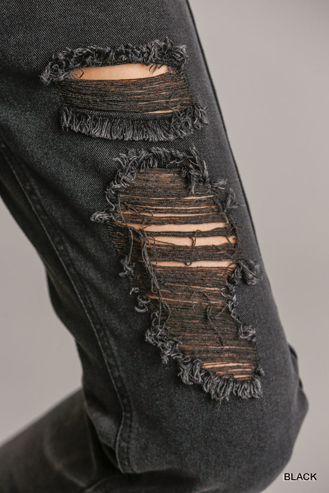 Distressed denim jeans