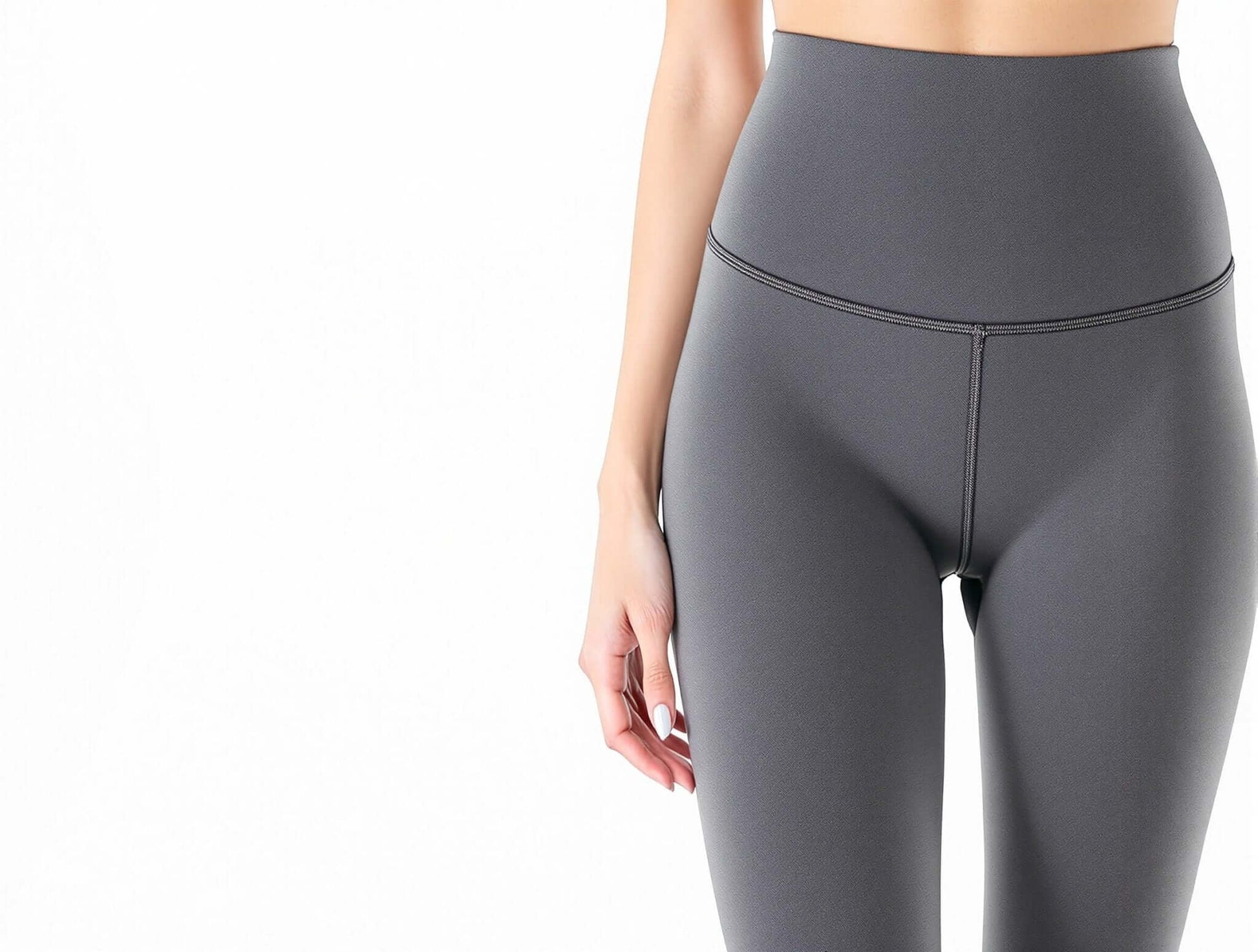 High-waisted compression leggings in sleek gray, perfect for stylish women's activewear and fitness fashion.