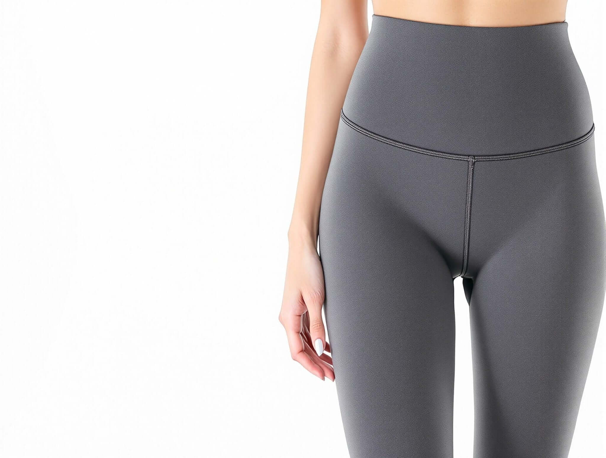 High-waisted compression leggings in sleek gray, perfect for stylish women's activewear and fitness fashion.