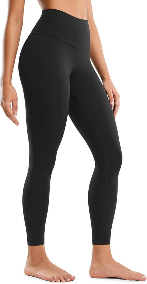 High-waisted black compression leggings from the Power Move Set, designed for comfort and style in women’s activewear.